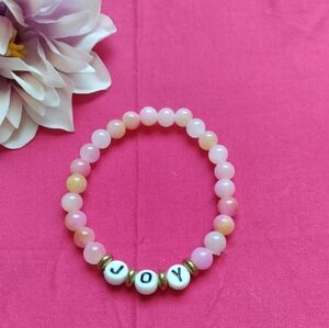 Handmade Stretch Pink Lemonade Beaded Bracelet with 'JOY' Letters
